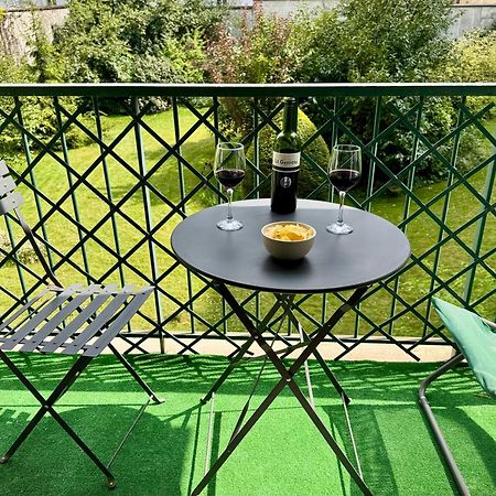 Superbe Appartement Avec Belle Vue Jardin Paris Bagian luar foto