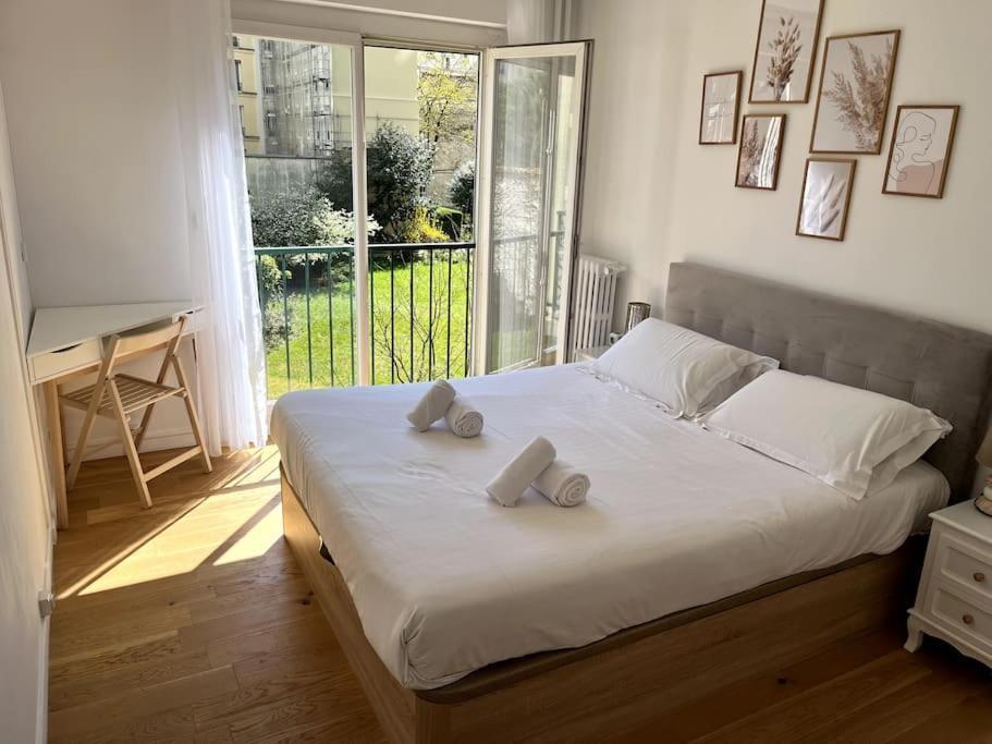 Superbe Appartement Avec Belle Vue Jardin Paris Bagian luar foto