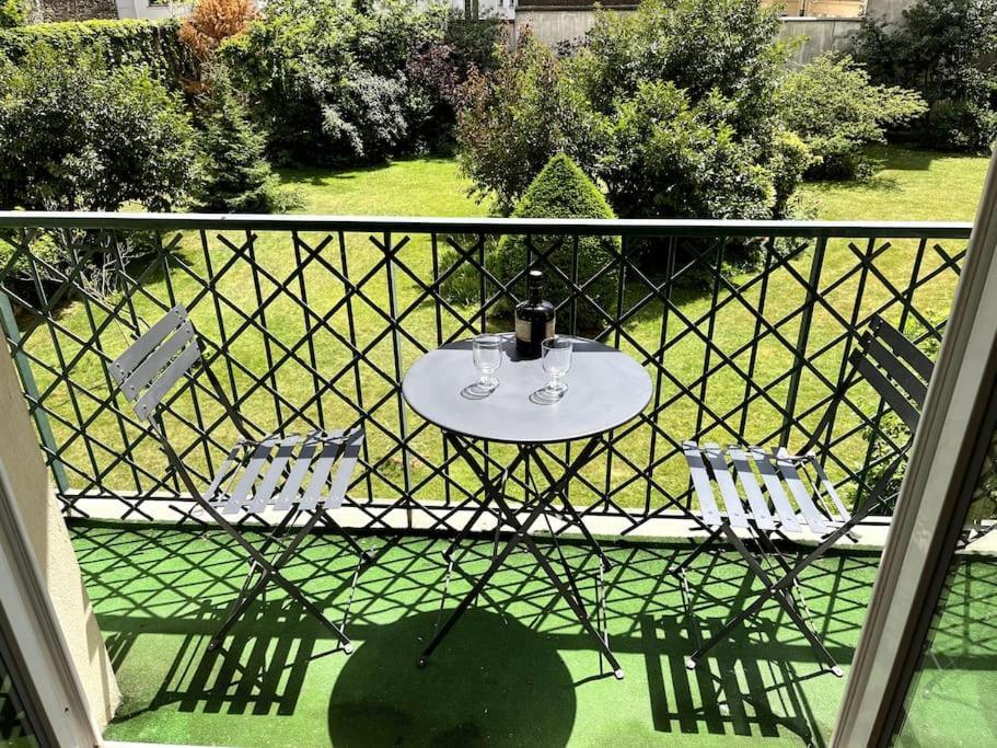 Superbe Appartement Avec Belle Vue Jardin Paris Bagian luar foto