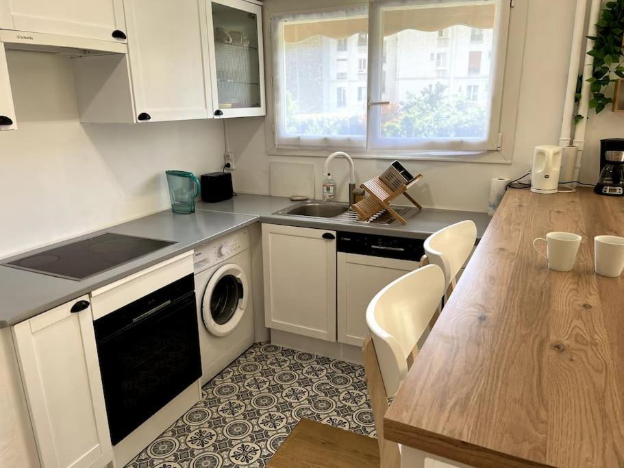 Superbe Appartement Avec Belle Vue Jardin Paris Bagian luar foto